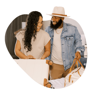 a happy couple in a hotel room image
