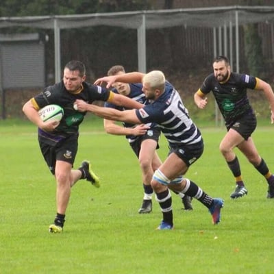 Gavin Hollins playing rugby